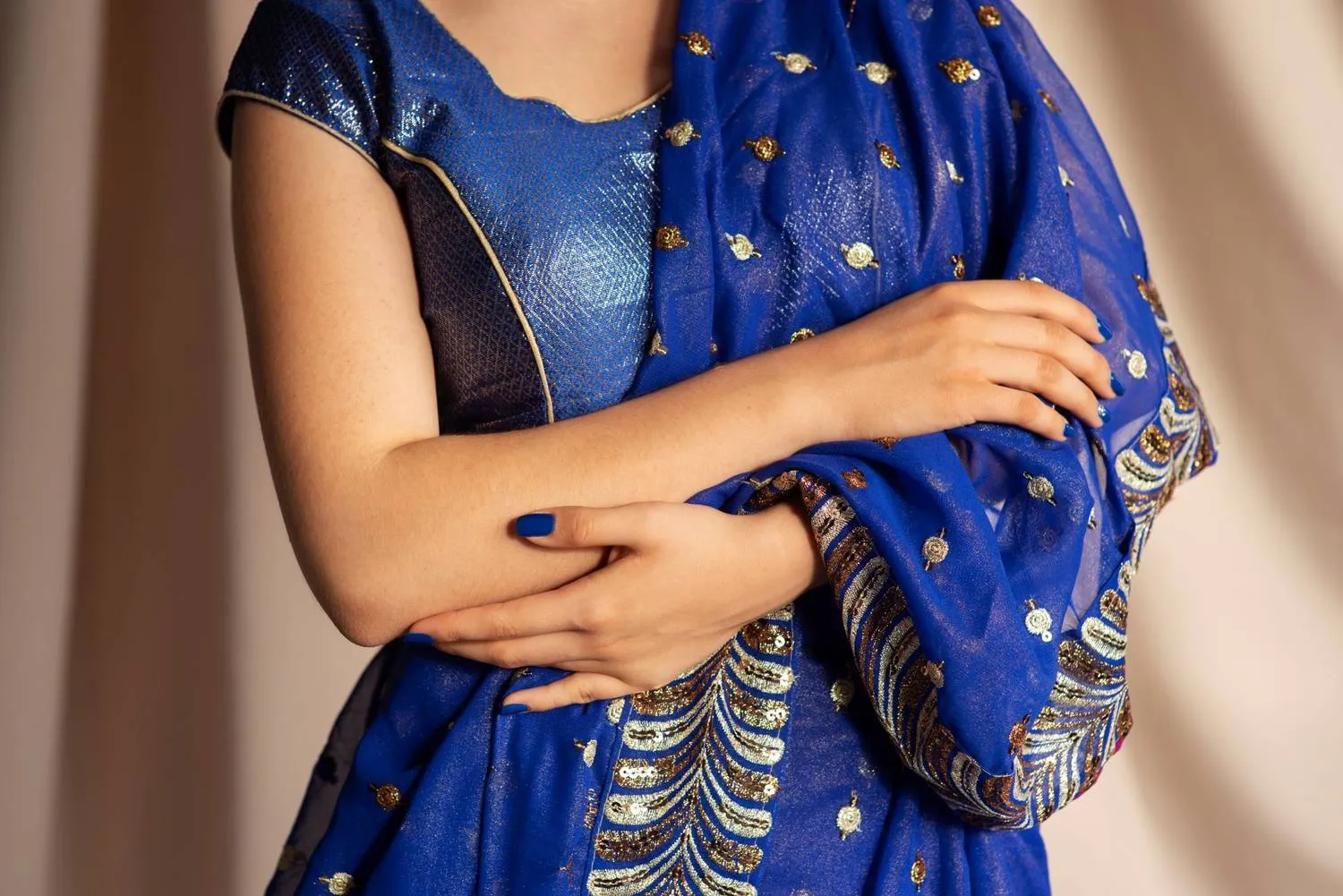 close-up-hands-woman-wearing-traditional-sari-garment-1-130510.jpg